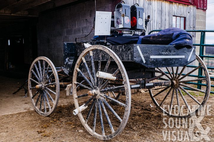 Dan Miller's simple alterations on his buggies following his wife and daughter's death include placing reflective PVC piping on the buggy's rear left wheel, a reflective rectangular whiteboard, gray reflective tape and improved lanterns. Photo by Richard Alan Hannon