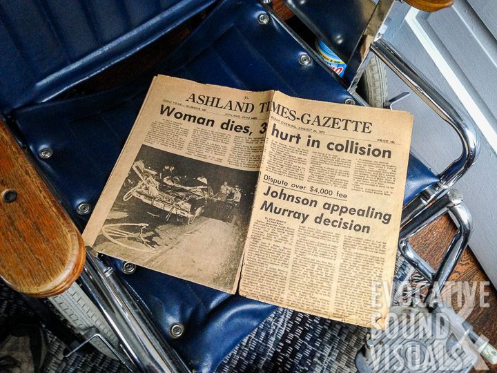 Rosie Yoder, wheelchair-bound since age 13 when an automobile driver under the influence of alcohol struck the buggy she was riding in August 1973, keeps a yellowed copy of the local newspaper that details her accident. Photo by Richard Alan Hannon
