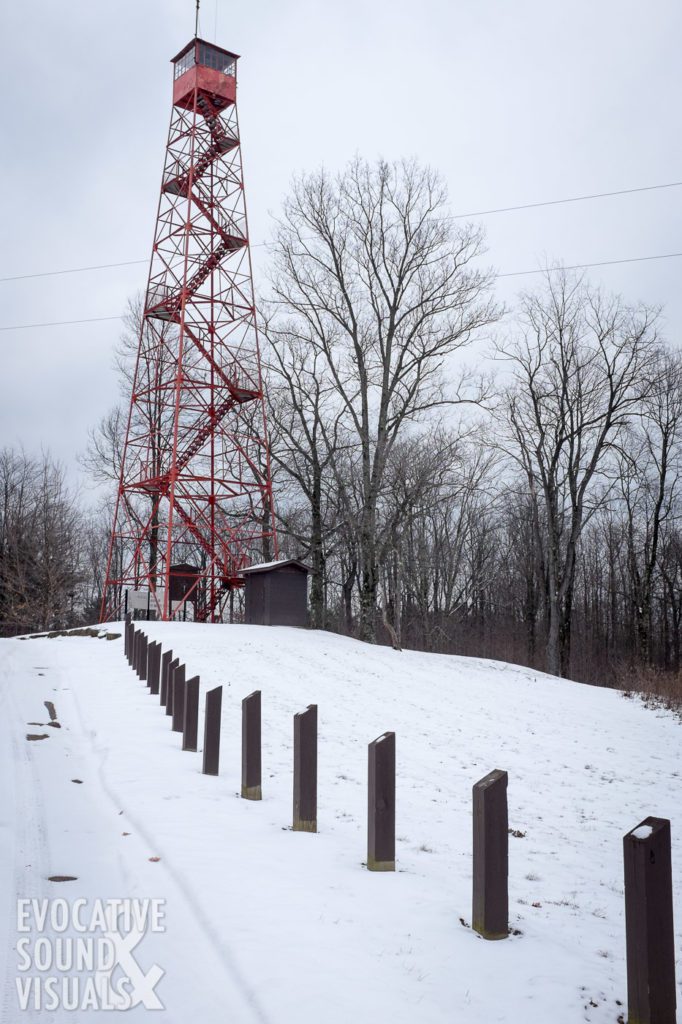 An 80-foot tall fire tower, built-in 1934 by members of the Civilian Conservation Corps, overlooks Mohican State Forest. Photo by Richard Alan Hannon