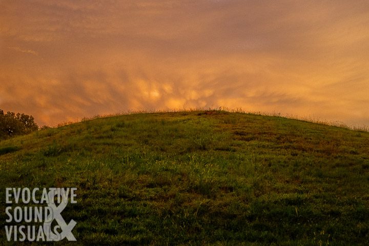 Sunset behind Mound B at Poverty Point State Historic Site in north Louisiana. Photo by Richard Alan Hannon