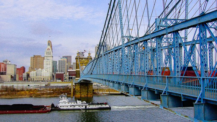 The Roebling Suspension Bridge spanning the Ohio River with the downtown Cincinnati skyline in the distance in December 2006. Photo by Richard Alan Hannon