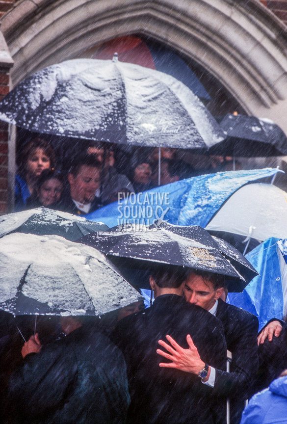 Matthew Shepard's friends and mourners brave heavy snow and snapping tree limbs to gather outside St. Mark's Episcopal Church in Casper, Wyoming Friday, October 16, 1998 to listen to a radio broadcast of the funeral services inside. Shepard had been baptized at the church. Photo by Richard Alan Hannon