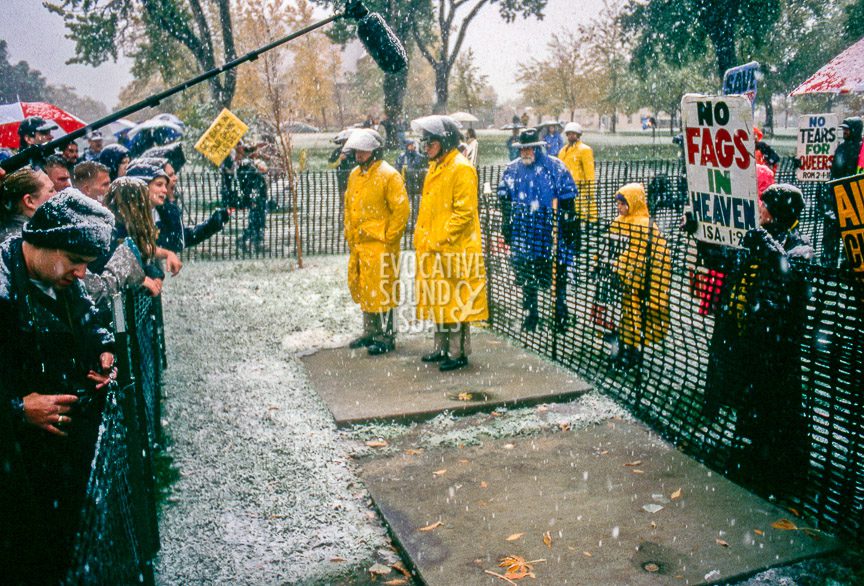 Police stand in a no man's land between friends and supporters of slain gay University of Wyoming student Matthew Shepard and members of Fred Phelps' Westboro Baptist Church of Topeka, Kansas, during Shepard's funeral in Casper, Wyoming on Friday, October 16, 1998. Photo by Richard Alan Hannon