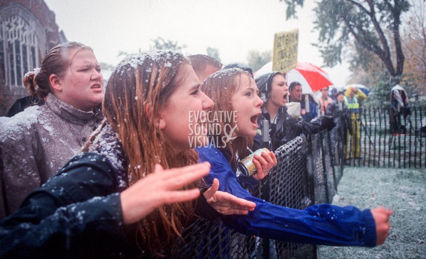 Friends of slain gay University of Wyoming student Matthew Sheppard shout at protestors from Westboro Baptist Church prior the start of Shepard's funeral in Casper, Wyoming on Friday, October 16, 1998. Photo by Richard Alan Hannon