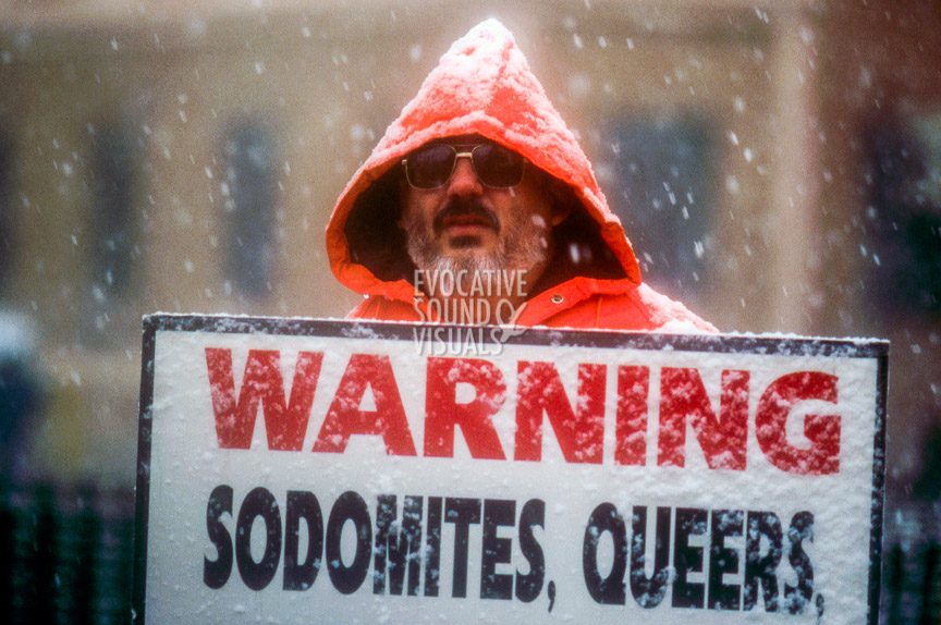 A member of the Westboro Baptist Church of Topeka, Kansas protests outside St. Mark's Episcopal Church in Casper, Wyo. on Friday, October 16, 1998 prior to Matthew Shepard's funeral. Photo by Richard Alan Hannon