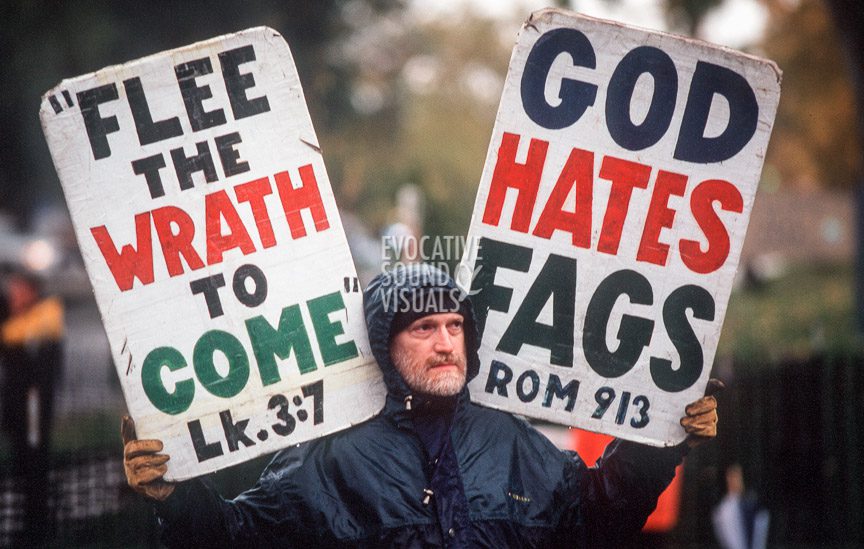 Karl Hockenbarger of Topeka, Kansas, and member of the Westboro Baptist Church, paces back and forth with anti-gay signs inside a quartered-off area outside St. Mark's Episcopal Church in Casper, Wyo. Friday, October 16, 1998 prior to Matthew Shepard's funeral. Hockenbarger has since been excluded from the church. Photo by Richard Alan Hannon