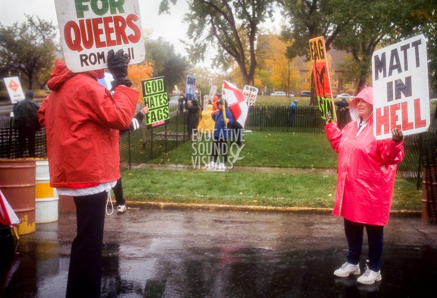 Members of Fred Phelps' Westboro Baptist Church of Topeka, Kansas, protest during Matthew Shepard's funeral in Casper, Wyoming on Friday, October 16, 1998. Photo by Richard Alan Hannon