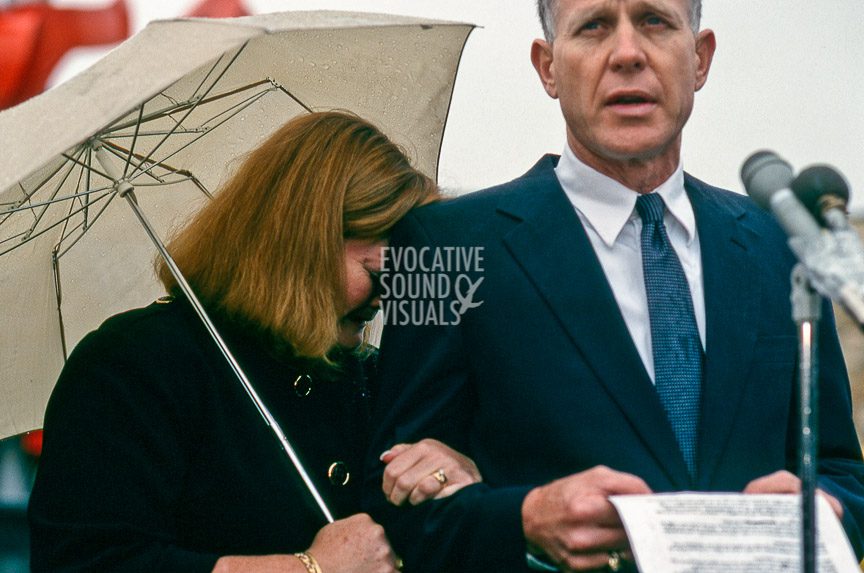 Judy Shepard, left, cries as her husband, Dennis Shepard, reads a statement to the media prior to their son Matthew Shepard's funeral in Casper, on Friday, October 16, 1998. Photo by Richard Alan Hannon