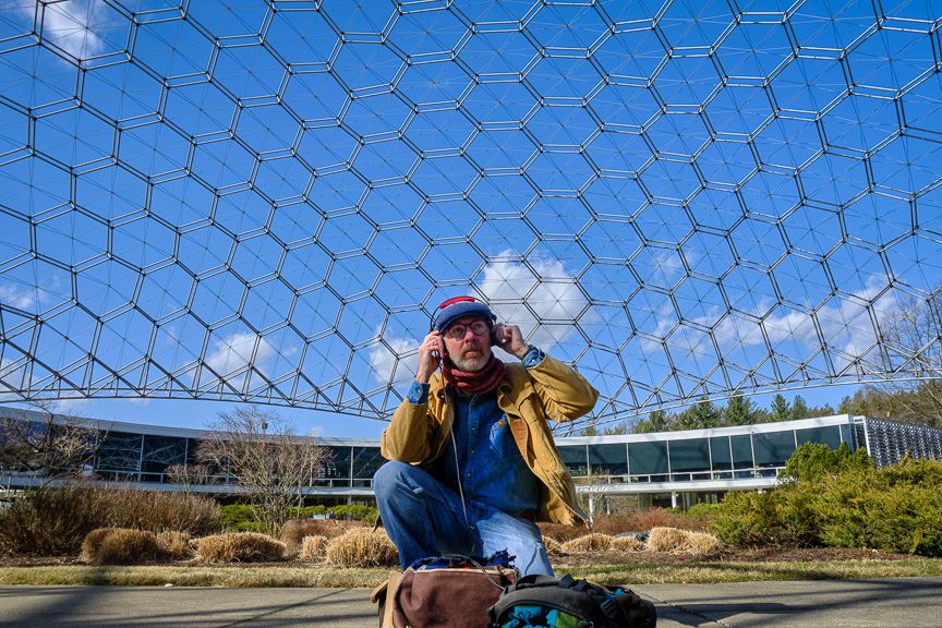Field recordist Richard Alan Hannon captures the sound of steady winds blowing across the open latticework geodesic dome that spans ASM International’s headquarters at Materials Park in Novelty, Ohio on Wednesday, February 15, 2023. The dome, built with extruded aluminum pipe in 1958 with over 65,000 parts, is the world’s largest open-work geodesic dome. It stands 103 feet high, measures 250 feet in diameter and weighs 80 tons. Photo by Richard Alan Hannon Wind Rushing Across a Geodesic Dome