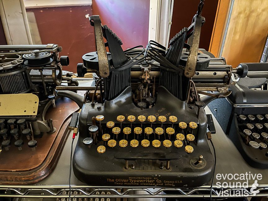Recording the sound of a vintage Oliver typewriter inside the Bedford Historical Society in Bedford, Ohio on Tuesday, May 30, 2023. Photo by Richard Alan Hannon