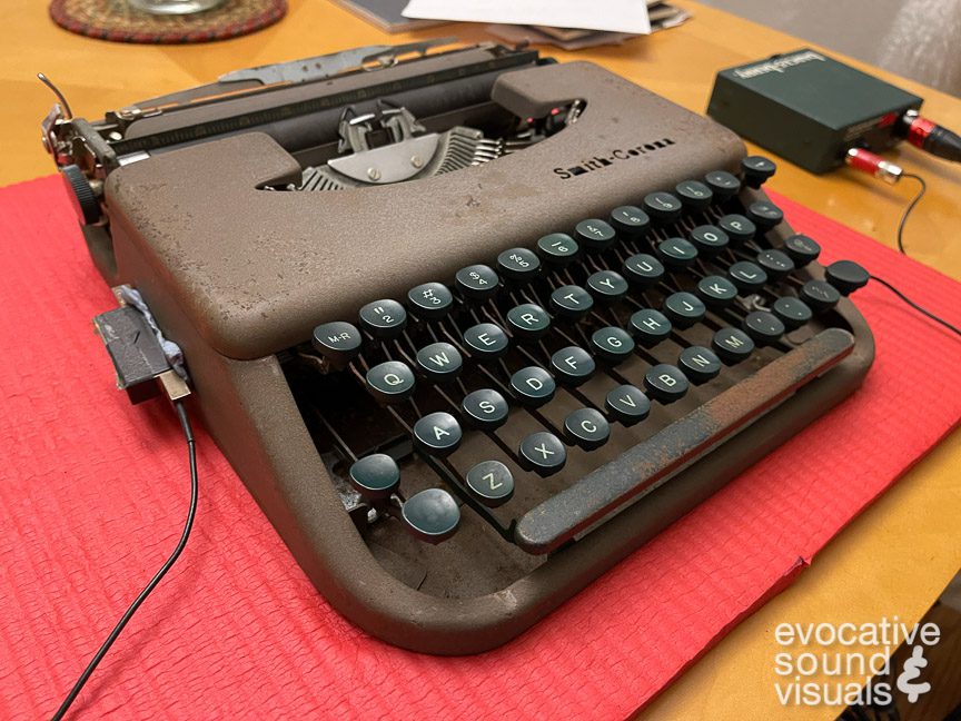 Capturing the sound of a Smith Corona Skyriter ultraportable typewriter with a pair of contact microphones. Photo by Richard Alan Hannon