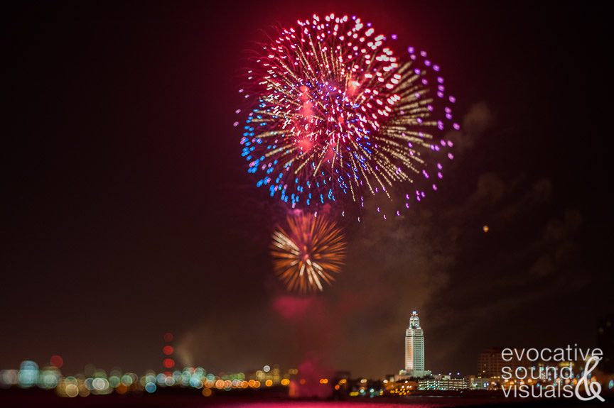 Fireworks erupt above the Baton Rouge skyline, including the 34-floor Louisiana State Capitol Building, July 4, 2009. Photo by Richard Alan Hannon