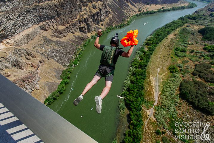 Neophyte BASE jumper Alex Armstrong of Cardon, Ohio jump off the Perrine Bridge on Saturday, July 28, 2018 in Twin Falls, Idaho. Armstrong has only three days of BASE jumping experience under his belt. Armstrong did 20 jumps while in the Army and 250 ski diving attempts, but with only a two second freefall as a BASE jumper, Armstong said, "I may reture after this." Photo by Richard Alan Hannon