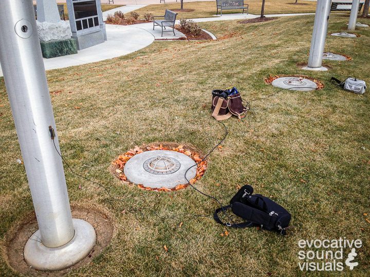 Capturing the sound of wind hitting the flagpoles with contact microphones at Julius Kleiner Park in Meridian, Idaho on November 27, 2019. Photo by Richard Alan Hannon